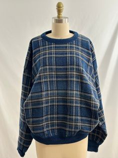 This 90s vintage sweater is one of my favorites. In a blue, white, black, gray plaid design,  it also has a round collar, with a great fit. Wear with an ankle length denim a black boot or gray joggers and sneakers for a cool street style vibe. -Vintage 90s -Minimalist plaid design -Machine wash recommended Measurements: marked a mens large *Sleeve 21  inches *Bust 25 inches *Length 25 inches *Bottom opening 16 inches  *Please note this item is pre loved and there may be minor flaws to the garment. Not to worry if there is anything major we will let you know. --Returns will not be accepted. I encourage you to ask questions for additional pictures, measurements, etc.-- Vintage Sweaters Men, Vintage Sweaters 90s, Cool Street Style, Vibe Vintage, Gray Joggers, Grandpa Sweater, Grey Joggers, Sweater Vintage, Blue White And Black