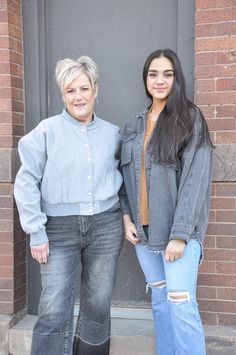 The Solid Bomber Jacket in light grey is a classic and versatile outerwear piece. This jacket features a snap front closure for ease of wear and a polished appearance. Bomber jackets are known for their timeless style, and this one in a light grey color offers a neutral and adaptable option for various outfits. Whether you're dressing it up or down, it's a great choice for different occasions and seasons. This type of jacket typically has ribbed cuffs and a ribbed hem, adding a sporty and sleek Gray Outerwear With Snap Buttons For Fall, Gray Button-up Outerwear With Buttoned Pockets, Oversized Gray Outerwear With Buttons, Gray Spring Outerwear With Button Cuffs, Gray Button-up Outerwear With Button Cuffs, Casual Gray Collared Outerwear, Casual Gray Long Sleeve Outerwear, Gray Everyday Spring Outerwear, Classic Gray Outerwear With Button Cuffs