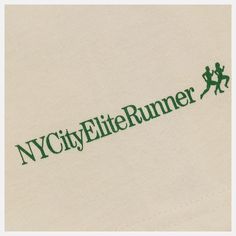 a white shirt with the words nyc city runner on it's left chest and green lettering