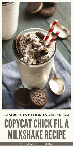 an oreo cookie milkshake in a glass with a candy cane