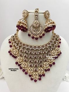 Premium quality Kundan Necklace comes with Jhumki Earrings and Tikka/ Indian Jewelry/Premium Quality Polki and Kundan Jewelry/wine purple color  All items are shipped from Brampton, Ontario, Canada. If you need your item by a certain day, please reach out to us for express delivery option before placing the order so that we can update the shipping for you. Standard shipping/delivery timeline Below are the delivery timeline estimates. We dispatch all orders by the next business day. ---> USA delivery timeline * 3-5 business days to major urban centers in USA. It may take 1-2 days extra to remote locations ---> Canada delivery timeline  * 2-3 business days - GTA  & Montreal  * 2-4  business days - Rest of Ontario/Quebec * 2-6 business days-  Rest of Canada    ---> Europe/Middle East timeline Elegant Purple Kundan Necklace For Wedding, Purple Stone Work Jewelry For Wedding, Elegant Purple Jewelry For Diwali, Purple Kundan Bollywood Jewelry, Purple Kundan Jewelry For Diwali, Festive Purple Kundan Jewelry, Purple Meenakari Jewelry For Wedding, Festive Purple Stone Work Jewelry, Festive Purple Jewelry With Stone Work