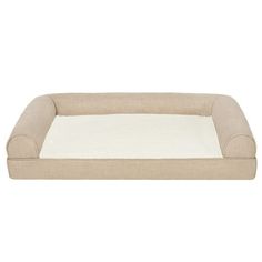 a dog bed that is made out of fabric and has a white mattress on top