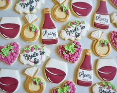 decorated cookies with wine and bride's gifts for the bride to be on display