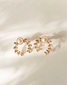 jewelry accessories Pearl Leaf Earrings Materials: gold plated brass acrylic pearl Measurements: in En Route Jewelry, Leaf Earring, Romantic Jewellery, Foto Poses, Gold Earrings Designs, Jewelry Wedding, Pretty Jewellery, Ear Jewelry, Leaf Earrings