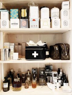 the shelves are filled with different types of perfumes and personal care products for sale