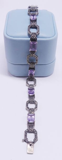 "Vintage marked 925 sterling silver marcasite and amethyst bracelet, In good vintage condition. It's 7\" long 10 mm wide and 2 mm thick. Weighs 18.1 gram. Thanks." Formal Silver Amethyst Bracelet, Formal Marcasite Gemstone Jewelry, Marcasite Bracelet, Sterling Silver Marcasite, Amethyst Bracelet, Bracelet Vintage, Link Bracelets, Chain Link, Jewelry Bracelets