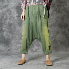 Spring Khaki Harem Pants With Loosely Fitted Hips, Spring Harem Pants With Loosely Fitted Hips In Khaki, Khaki Harem Pants For Workwear In Summer, Summer Workwear Khaki Harem Pants, Green Cotton Pants With Buttons, Summer Green Pants With Buttons, Green Summer Bottoms With Buttons, Green Cotton Ankle-length Bottoms, Green Ankle-length Cotton Bottoms