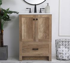 a bathroom with a sink and wooden cabinet