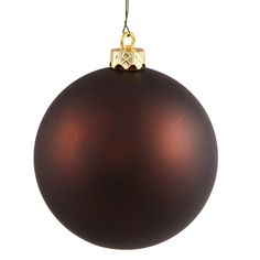 a brown ornament hanging from a green cord