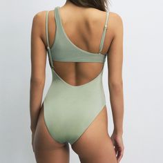 The Luna series, notable for its playful neckline details and comfortable fit, is an ideal option for those who prefer a simple and elegant style at the beach. This swimsuit, which can be comfortably worn both at the beach and by the pool, will provide comfort throughout the day. You can complete the look with denim pieces and carry your beach elegance to the city. Back neckline. Adjustable straps. Ribbed trim fabric. Gold-plated House of Silk gem at the center of the chest. 81% Polyamide 19% El Seamless One-piece For Summer, Fitted Seamless Swimwear For Summer, Seamless Stretch Swimwear For Summer, Seamless Summer Swimwear, Stretch Seamless Swimwear For Summer, Stretch Seamless Summer Swimwear, Seamless One-piece Swimwear, Seamless One Pieces For Summer, Solid Seamless One Pieces For Summer