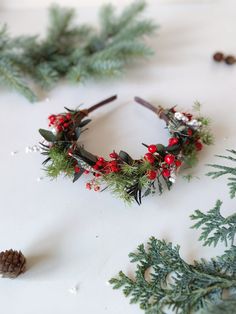 Flower headband in woodland Christmas design with needles and  red berries :) The flower headband is made of artificial and preserved material, red berries and other arranging material. When stored in dry and dark place, our products last 10-15 years. We can also make you other matching accessories. Please message me for more information. :) ---------------------------------------------------------------- SHIPPING INFO FOR EU ORDERS: Standard shipping: Your package will arrive in about 5-8 days Christmas Dried Flowers, Christmas Headbands, Christmas Woodland, Headband Winter, Headband Vintage, Winter Headband, Dala Horse, Christmas Headband, Winter Headbands