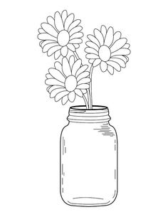 a mason jar with flowers in it