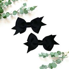 Complete your little girl's outfit with our set of solid black hair bows. This is a set of 2 bows making them perfect for pigtails! Each bow is handmade with grosgrain ribbon affixed with an alligator clip with an anti-slip grip. The ends are heat treated to prevent fraying. Each bow measures about 2.5 inches in length not including ribbon tail. Please note: We do our best to accurately represent the colors of our products, however please note that color of product may slightly very due to device/monitor screen settings. Solid Black Hair, Hair Bows Black, Pigtail Hair Bows, Small Hair Bows, Black Hair Accessories, Black Hair Bows, Pigtail Hairstyles, Black Accessories, Girl Hair Bows