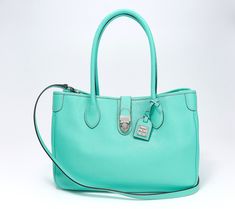 Pulled straight from the archives, this fine leather tote looks just as chic now as it did back in 2006. The tucklock closure is a standout detail that not only adds visual interest, it also secures your personal belongings. From Dooney & Bourke. Classic Satchel With Turn-lock Closure For Shopping, Turquoise Bags With Leather Handles For Everyday Use, Everyday Turquoise Tote Satchel, Leather Satchel With Turn-lock Closure For Shopping, Turquoise Double Handle Bag For Daily Use, Cheap Turquoise Tote Shoulder Bag, Affordable Turquoise Tote Shoulder Bag, Back In 2006, Dooney And Burke