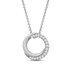 This is a sterling silver open circle pendant necklace with 1/4 carat total weight of natural white round diamonds. The pendant is attached to an 18-inch cable chain. Modern Sterling Silver Diamond Necklace With Round Pendant, Silver Diamond Open Circle Necklace, Sterling Silver Diamond Necklace With Round Pendant, Diamond White Diamond Necklace With Cable Chain, Diamond White Cable Chain Diamond Necklace, White Gold Diamond Necklace With Open Circle Accents, White Gold Diamond Necklace With Open Circle, Sterling Silver Open Circle Necklace With Diamond Accents, Silver Circle Necklace With Diamond Accents