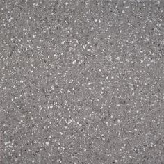 an asphalt surface with small white dots on the top and bottom, in grey tones