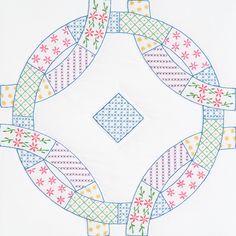 a cross - stitched design in the shape of a circle