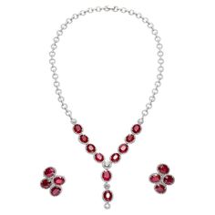 Necklace and earrings in 18kt white gold set with 2 oval cut rubies 0.53 ctss and 41 baguette cut diamonds 0.51 cts and 40 diamonds 0.28 cts Necklace And Earing, Ruby Diamond Necklace, Goth Wardrobe, Jewelry Ruby, White Gold Set, Ruby Necklace, Pendent Necklace, Expensive Jewelry, E 40