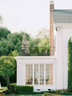 a large white house with lots of windows