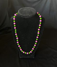 The pattern of this necklace is bubblegum pink and lime green beads.  Lightweight and cute. Playful Pink Necklace With Colorful Beads, Green Large Beads Party Necklace, Green Large Beads Necklace For Party, Playful Pink Beaded Chain Jewelry, Fun Pink Beaded Necklaces, Fun Pink Beaded Necklaces With Round Beads, Playful Pink Jewelry With Beaded Chain, Pink Beaded Necklaces With Round Beads, Fun Style, Playful Round Beads Necklaces For Parties