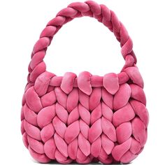 a pink handbag with hearts on it