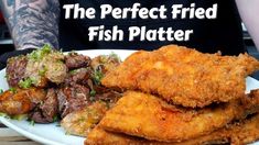 the perfect fried fish platter is ready to be eaten