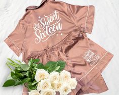 Personalized Sweet 16 Pajamas - Birthday Party Sleepwear & Gifts 🎉 Celebrate her Sweet Sixteen in style and comfort with these stunning personalized satin pajamas! Perfect for sleepovers, photoshoots, or as unique party gifts, these PJs add a special touch to the big day and create memories that will last a lifetime. ✨ Ideal For: Sweet 16 Party Sleepovers & Photoshoots, Personalized Birthday Gifts for Guests or the Birthday Girl, Matching Sets for Girls' Night ✨ Gift-Ready: Each set comes packaged in a cute organza bag. ✨ Personalized Just for You: Add names, initials, or sweet 16 logo, or birthday date. ✨ Soft Satin Feel: Luxuriously smooth and breathable for all-night comfort. ✨ Perfect for Every Party Theme: Available in 14 beautiful colors to match any party vibe. ✨ Great Gift Idea - Birthday Gifts For Guests, Pajamas Birthday Party, Pajama Birthday Parties, Satin Pajamas Set, Satin Pyjamas, Bridesmaid Pjs, Birthday Gift For Daughter, Party Vibe, Sweet 16 Party