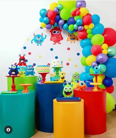 an assortment of colorful balloons and decorations for a kids's birthday or baby shower