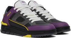 Handcrafted low-top buffed leather, suede, and canvas sneakers in black, purple, and gray. · Perforated detailing throughout · Lace-up closure · Logo patch at padded tongue · Padded collar · Gold-tone logo stamp at outer side · Mesh lining · Logo embossed at textured rubber midsole · Treaded rubber sole Supplier color: Black/Purple Purple Sneakers With Studded Outsoles For Streetwear, Purple Leather Skate Shoes With Rubber Sole, Casual Purple Sneakers With Studded Outsoles, Modern Purple Leather Sneakers, Canvas Sneakers, Logo Stamp, Sneakers Black, Team Colors, Patch Logo