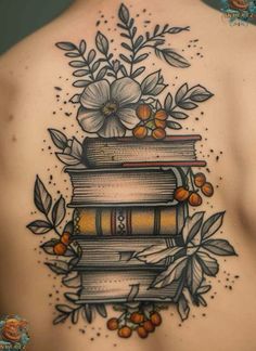 a woman's back with books and flowers on it