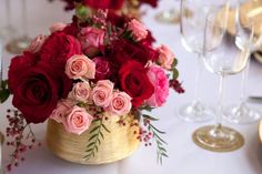 the table is set with many different types of flowers