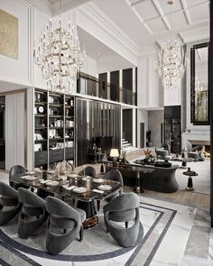 an elegant dining room with black and white decor