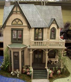 a doll house is shown on a table