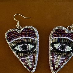 Evil eye earrings Embroidery heart earrings Large beaded eye | Etsy Earrings Embroidery, Beaded Eye, Trending Earrings, Embroidery Heart, Embroidery Hearts, Evil Eye Earrings, Earring Trends, Heart Shaped Earrings, Eye Earrings