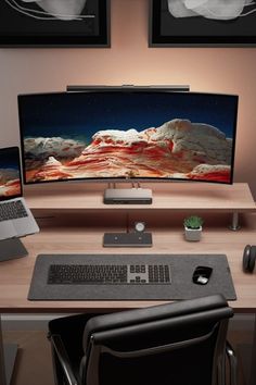 a computer desk with two monitors and a keyboard