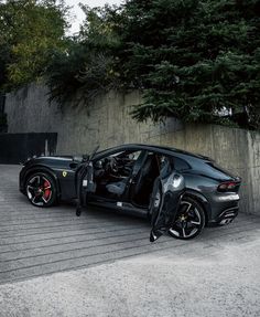 a black sports car with its door open