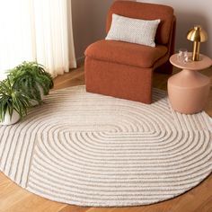 Elevate your living space with the understated elegance of this contemporary round area rug, meticulously hand-tufted in India to ensure exceptional quality and longevity. Spanning an ideal size of 6 feet by 6 feet with a comfortable pile height of 3/8 inches, this rug boasts a harmonious blend of 55% wool and 45% polyester, offering a perfect balance of softness and durability. The rug showcases a captivating pattern featuring concentric circles and clean stripes in a soothing palette of ivory Round Area Rugs In Bedroom, Boho Round Rug, Round Rugs In Living Room, Round Rugs Dining Table, Round Rug Office, Small Round Rugs, Basement Office, Small Kitchen Tables, Sitting Areas