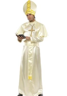 a man in a priest costume standing with his arms crossed and holding a tablet computer