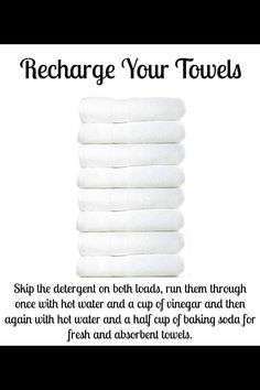 a stack of white towels with the words recharge your towels