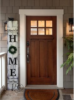 a welcome mat is placed in front of a door