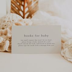 there is a card that says books for baby on it next to some mushrooms and other things