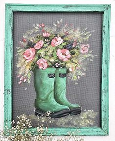 a painting of green boots with pink flowers in them