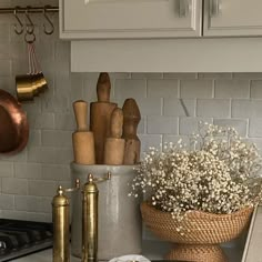 the kitchen counter is clean and ready to be used as a cooking utensil holder