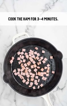 ham cooking in a cast iron skillet with text overlay that reads, cook the ham for 3 - 4 minutes