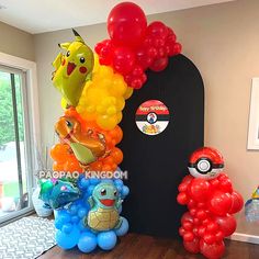 some balloons are in the shape of pokemons and pikachu's on display