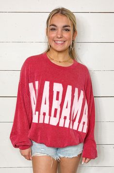 The Alabama Crimson Long Sleeve Top is oh-so comfy and oversized. With a crewneck style and long drop shoulder sleeves, you'll be feeling cozy and stylish. Plus, in the bold and bright Alabama crimson red, you'll stand out in any crowd. It's a must-have for any fan or fashionista! Oversized Red Sweater With Letter Print, Red College Sweater With Ribbed Cuffs, Red Letter Print Sweater For Fall, Red Long Sleeve Sweater For College, Red Relaxed Fit Sweater With Letter Print, Oversized Red Ribbed Sweater, Trendy Red Sweater For Loungewear, Red Sweater For Spring Loungewear, Red Trendy Sweater For Loungewear