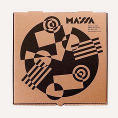 a cardboard box with an abstract design on it