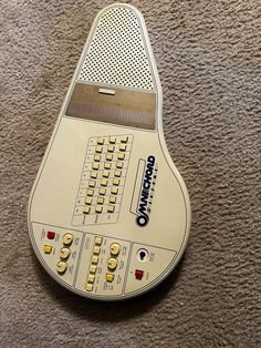 an electronic device sitting on top of a carpet