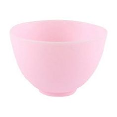 a pink bowl sitting on top of a white table