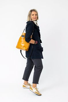 Our Everyday Collection of handbags reflects our task, offering tried + true styles + combinations that are timeless + classic. Colors + sizes to keep up with your effortless style + quality that holds up to your everyday adventures. Four outside pockets and four interior pockets make this our most functional bag., Did we mention it holds a laptop? In fine Alexis Drake fashion, the Train Tote is effortless and everyday. Available in Black + Rocky and Rocky + Navy. Dimensions : 14.75" X 14" X 4.5 Drake Fashion, Train Adventure, Bison Leather, Everyday Adventures, Summer Jeans, The Train, Shoulder Tote, Keep Up, Timeless Classic